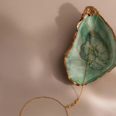 Elegant wrist view of Ava Drop Chain Bracelet showcasing its refined and timeless design.