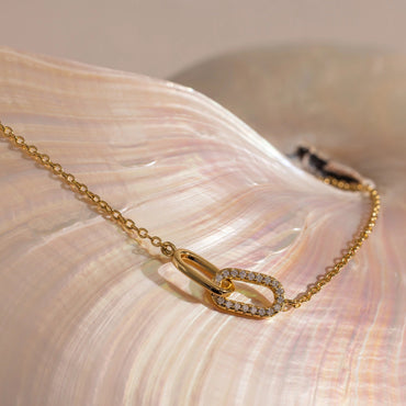 Close-up of The Noelle Pave Bracelet with a pave-set pendant on a delicate linked chain, crafted by LUXEZ Jewels.