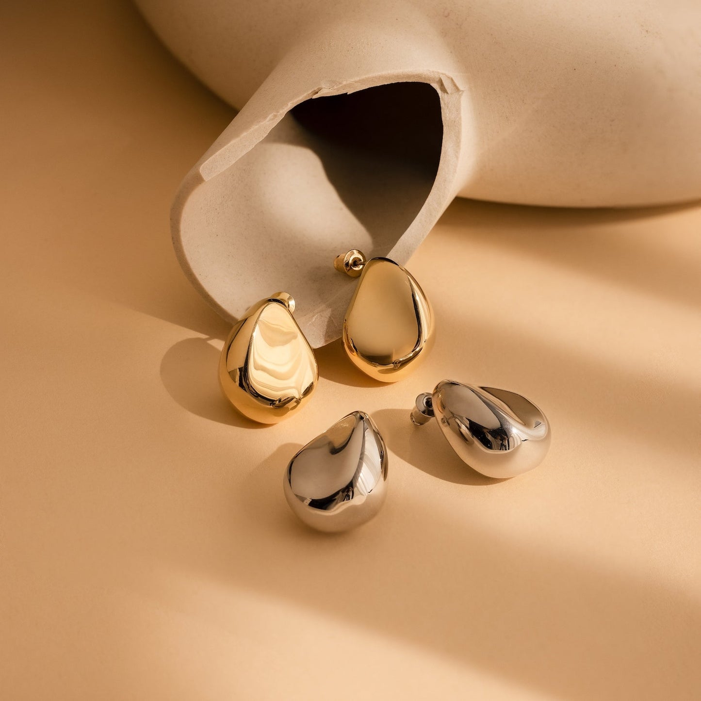 Bold _Teardrop_Stud_Earrings_gold_silver