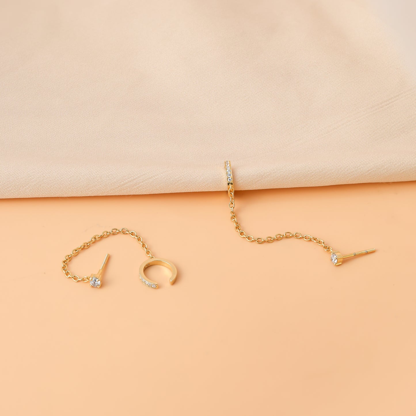 Gold pave chain ear cuff with crystal detailing