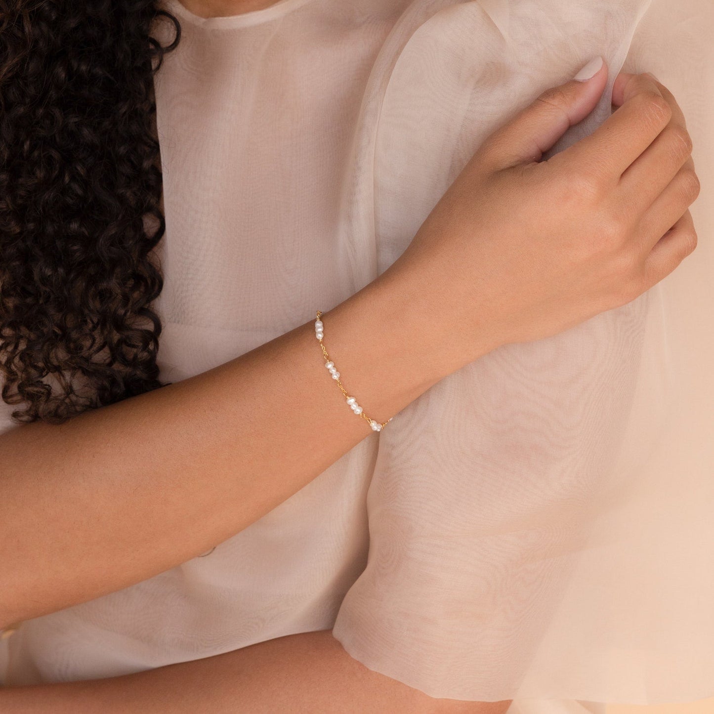 Timeless Grace: Hali Pearl Station Bracelet