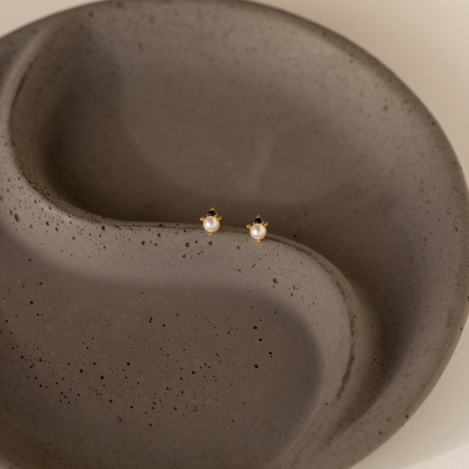 Elevated Elegance: Onyx and Pearl Stud Earrings