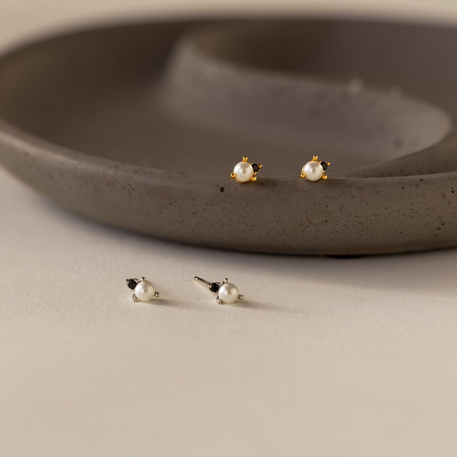 Elevated Elegance: Onyx and Pearl Stud Earrings