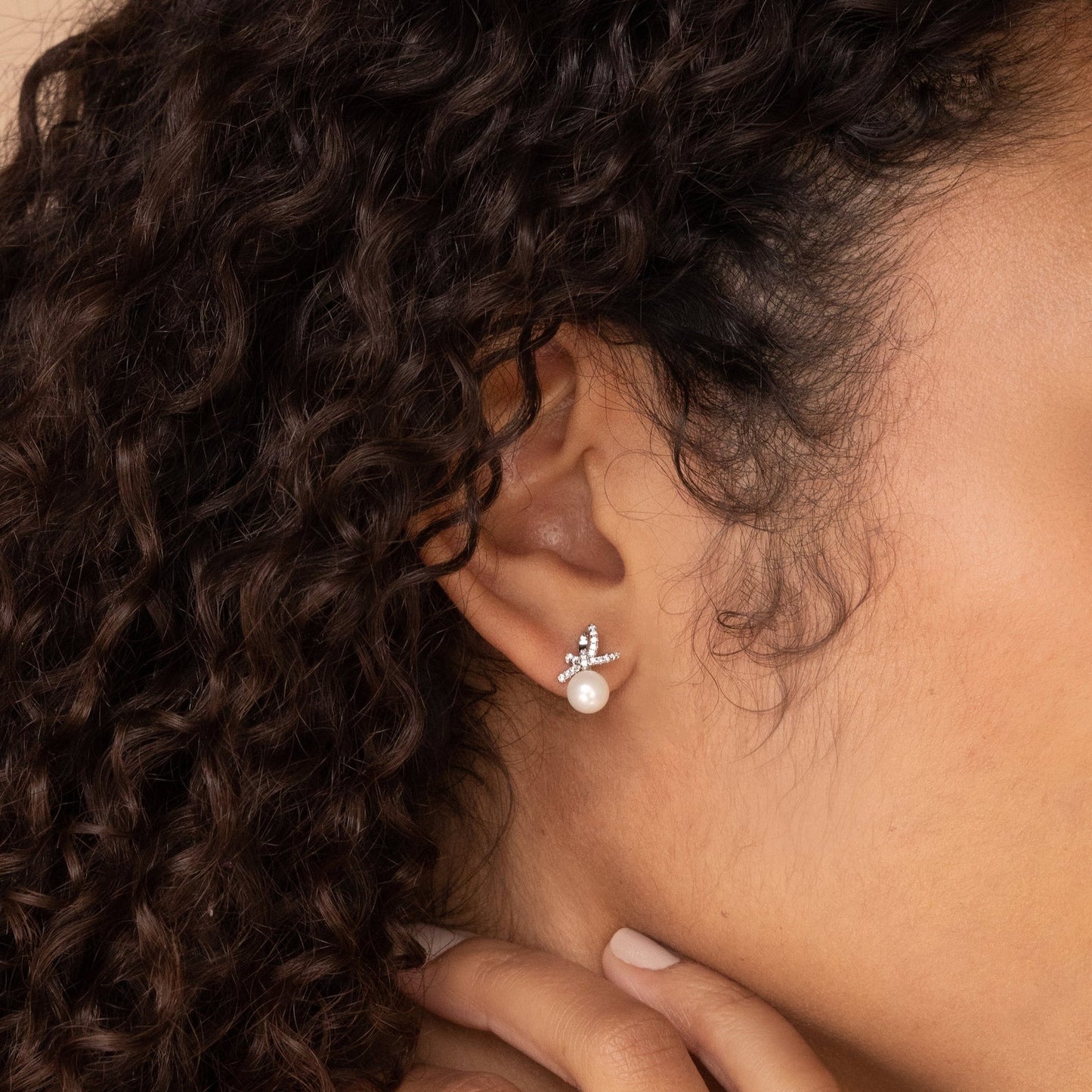 Charming Elegance: Pearl Bow Stud Earrings Sterling Silver
