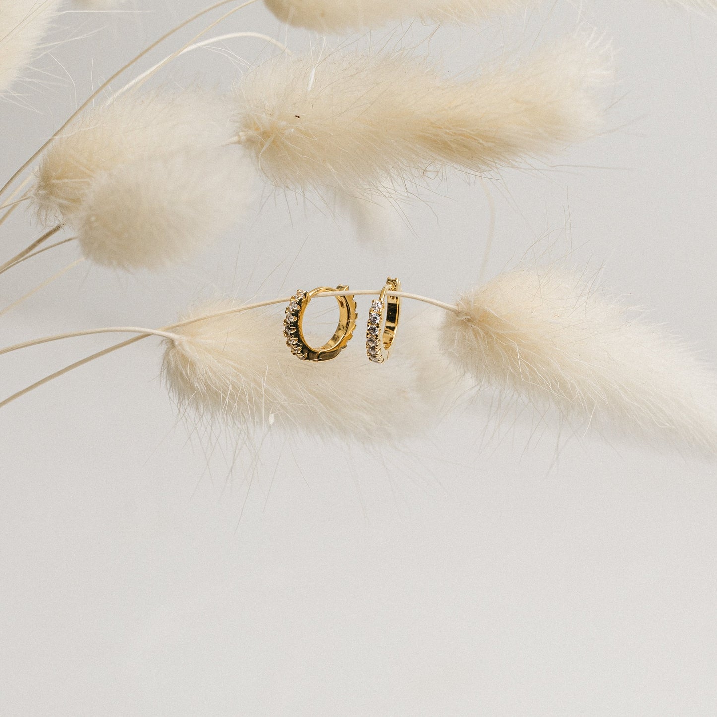 Elevate Your Everyday: Coco Pave Huggie Hoops