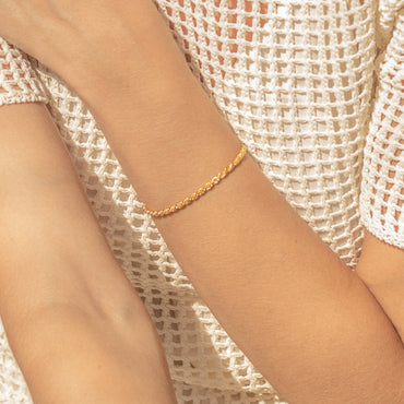 Nautical Chic: Rope Chain Bracelet with Beautiful Girl Hand.