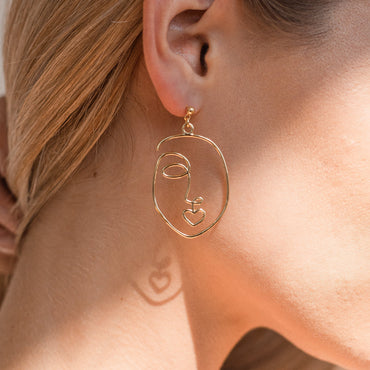 Ethereal Expressions: Abstract Face Earrings