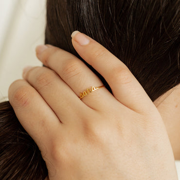Chic Elegance: The Petite Script Name Ring