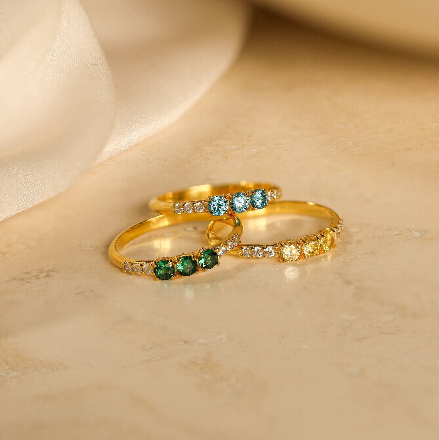 Eternal Splendor: The Pave Triple Birthstone Eternity Ring