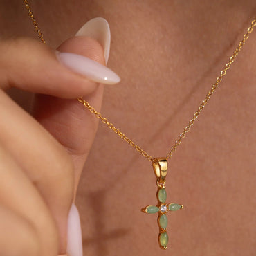 Close-up of marquise-cut jade gemstones forming a sleek cross pendant on the Serenity Jade Necklace by LUXEZ Jewels.