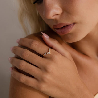 Close-up of a woman wearing a diamond ring on her hand