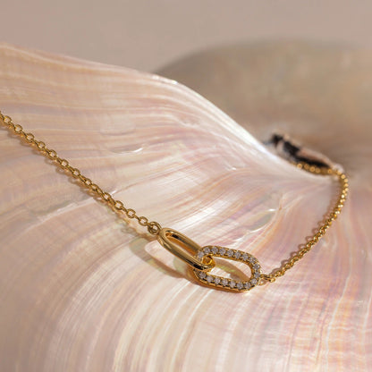 Close-up of The Noelle Pave Bracelet with a pave-set pendant on a delicate linked chain, crafted by  LUXEZ Jewels.