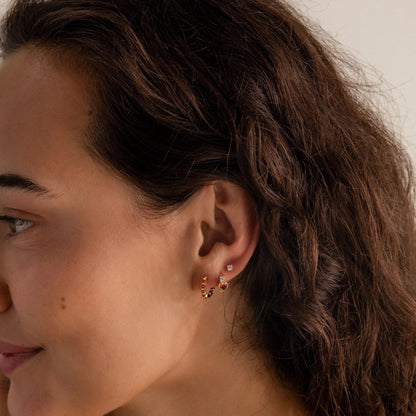 925 sterling silver hoops with round-cut amethyst gemstones