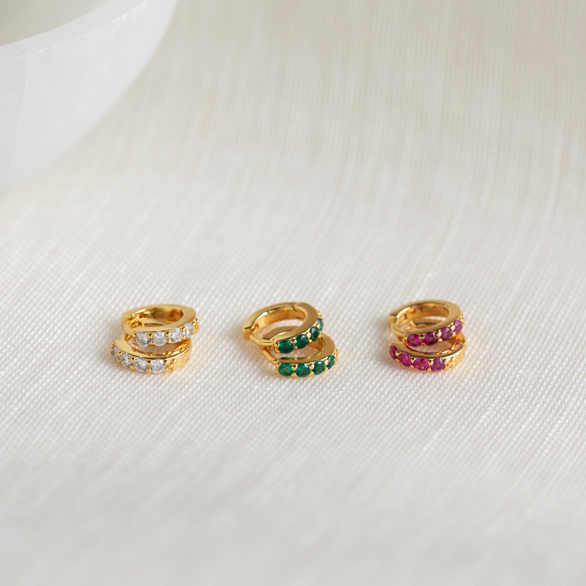 Emerald Huggie Hoops: Timeless Elegance in Stunning Green