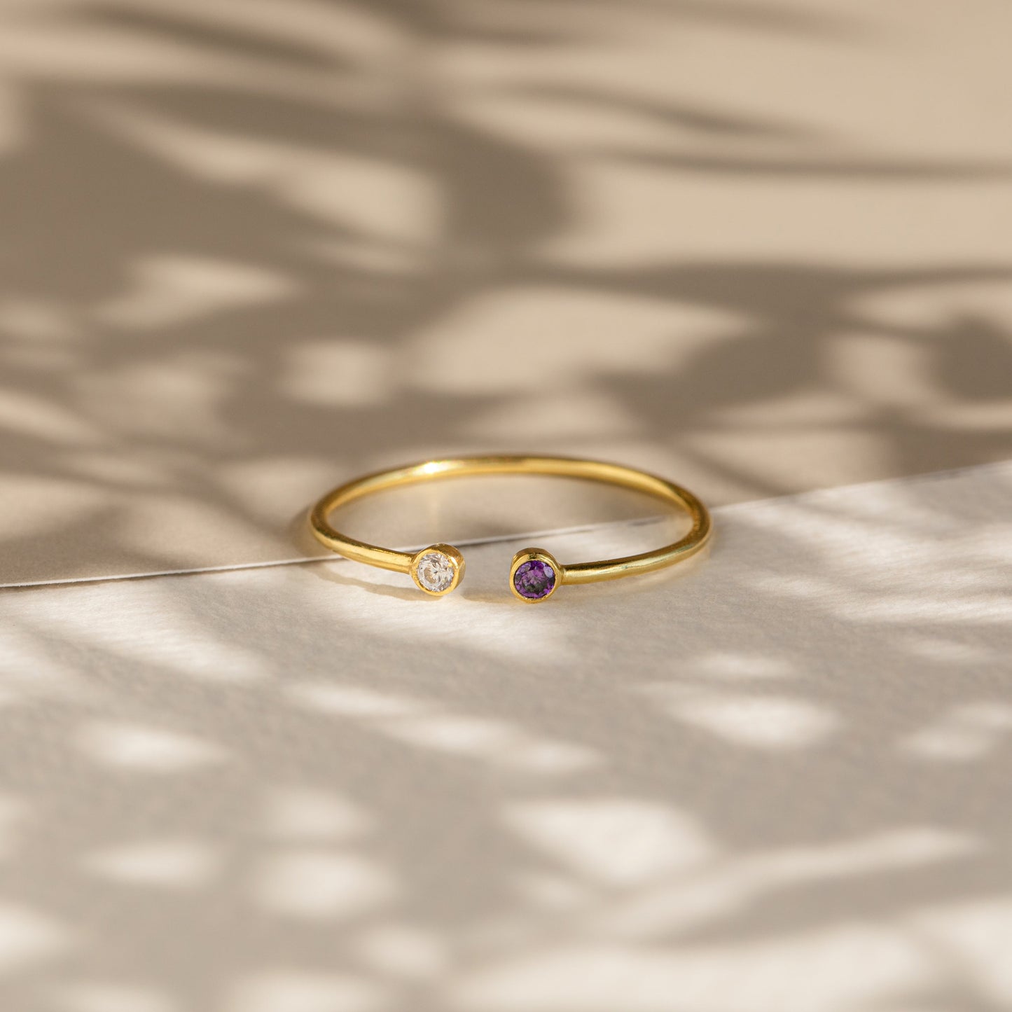 Cherished Connections: The Tiny Dual Birthstone Ring