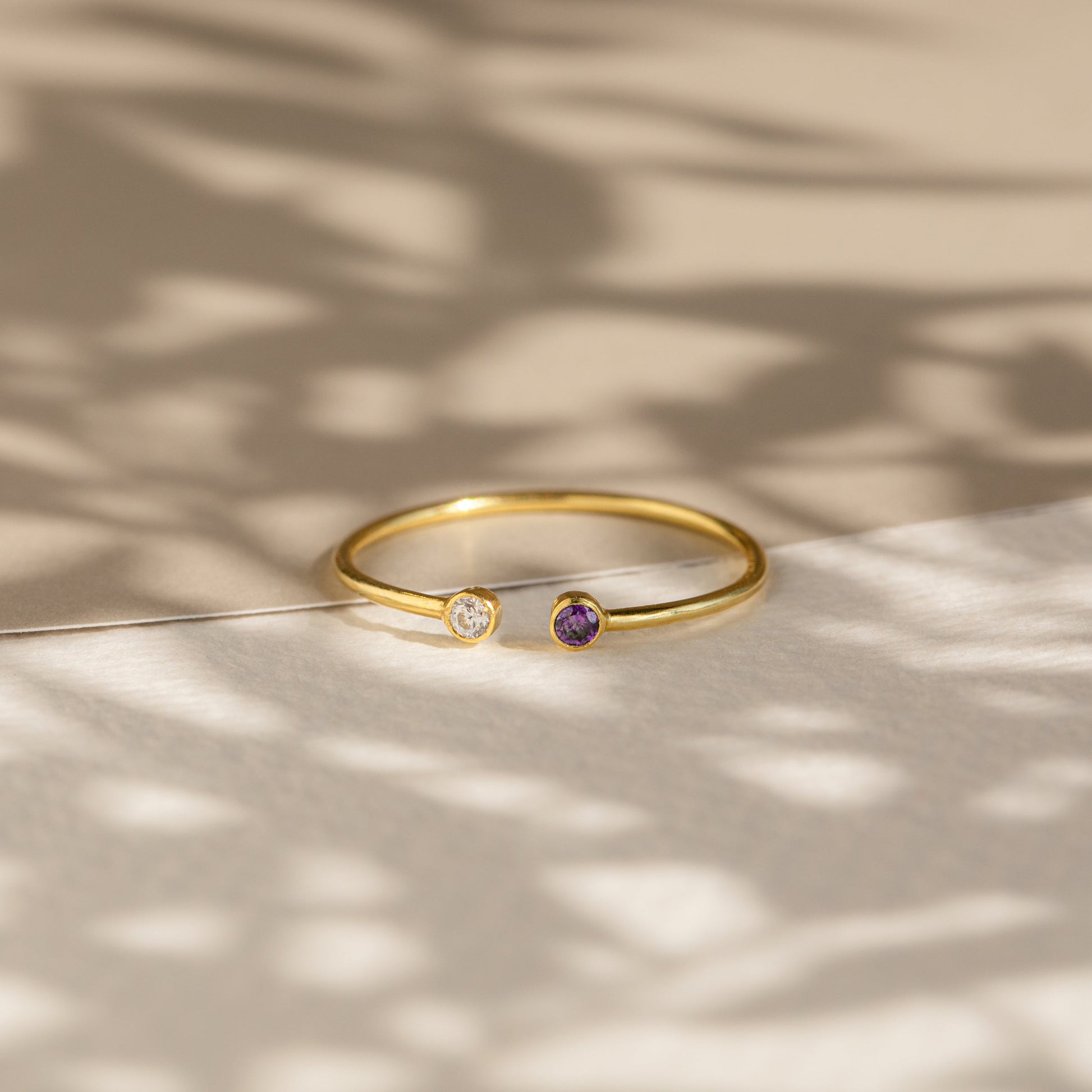 Cherished Connections: The Tiny Dual Birthstone Ring