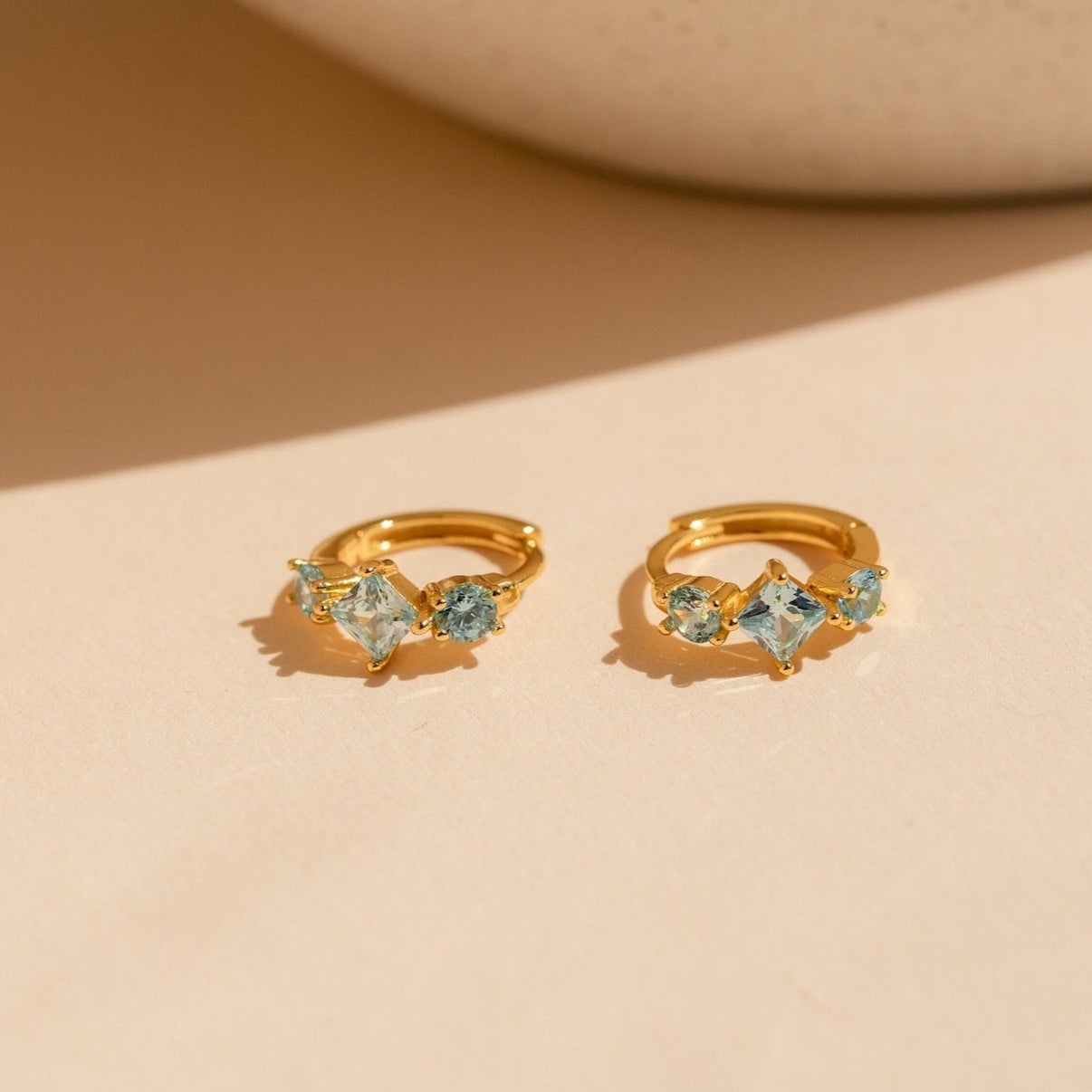 Seaside Chic: Aquamarine Huggie Hoops