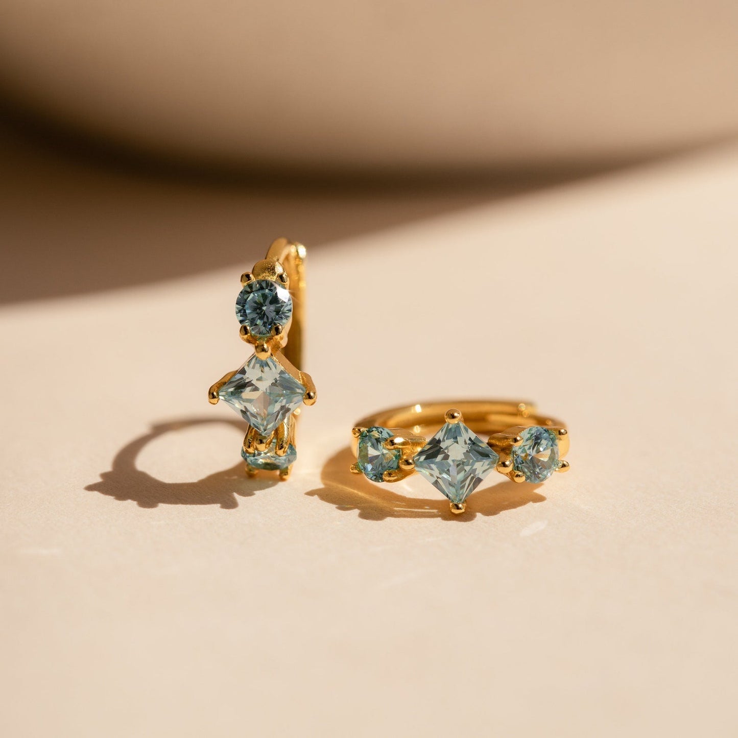 Seaside Chic: Aquamarine Huggie Hoops 18K Gold
