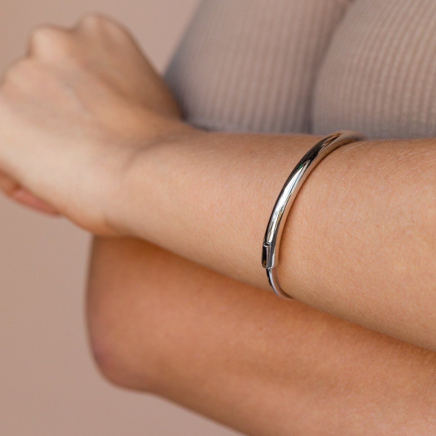 Aris Hinge Bangle, a modern vermeil cuff bracelet in sterling silver or 18K gold, featuring a sleek and streamlined design for effortless style