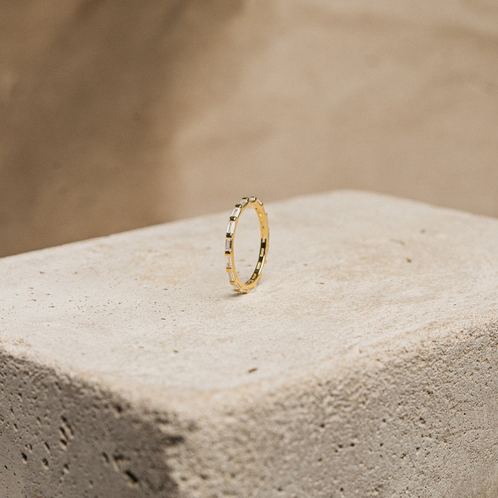 Baguette Eternity Ring With White Stone.