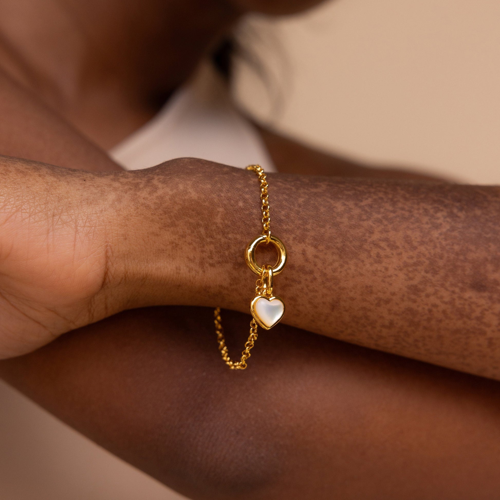Mother_of_Pearl_Heart_Charm_hand_view