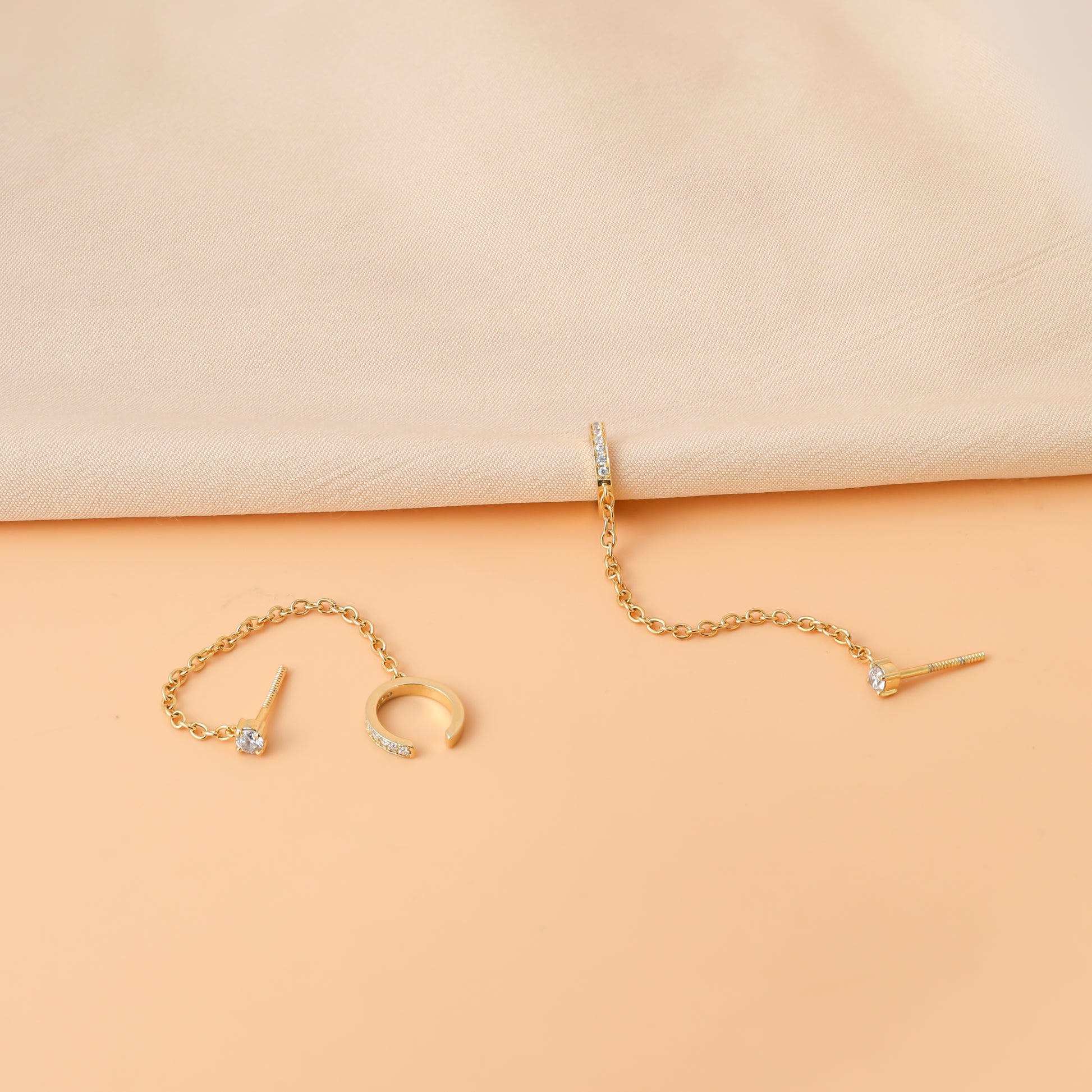 Gold pave chain ear cuff with crystal detailing