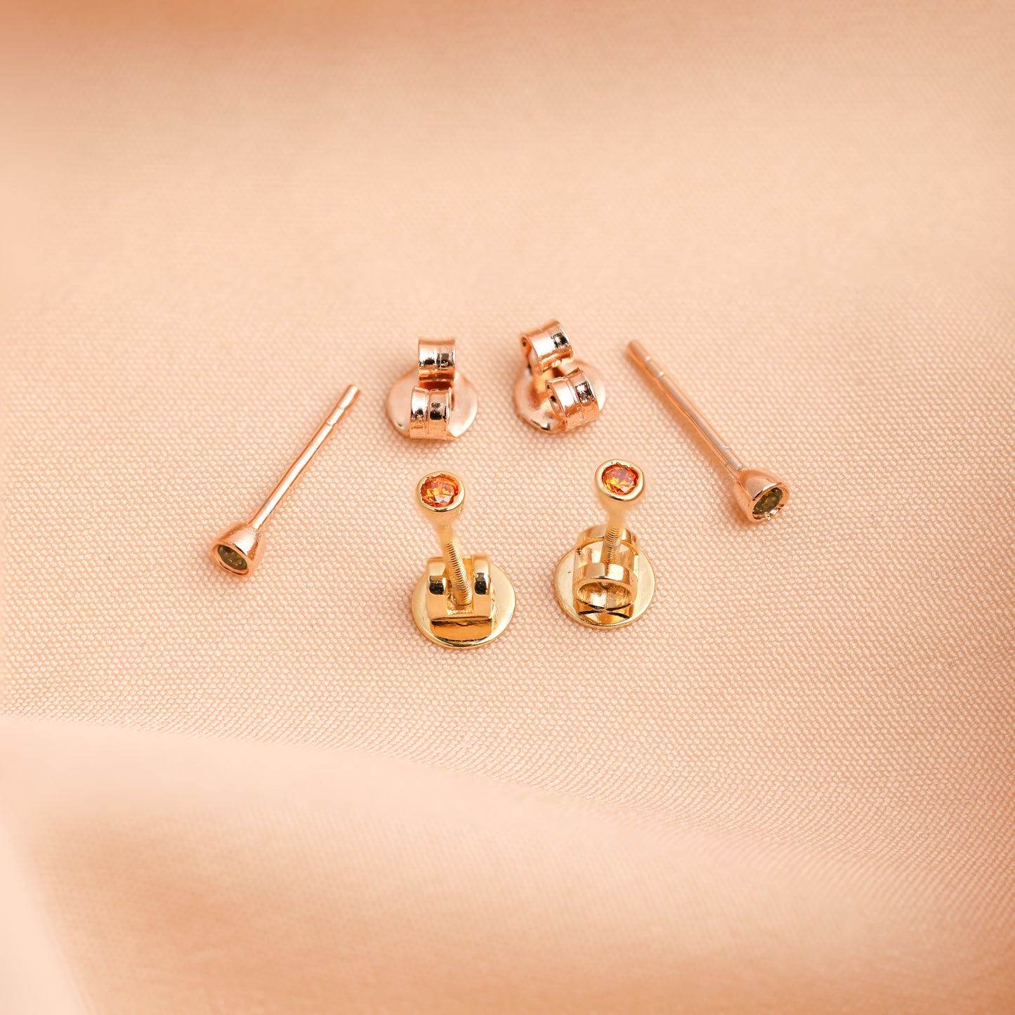 Minimalist stud earrings featuring birthstones