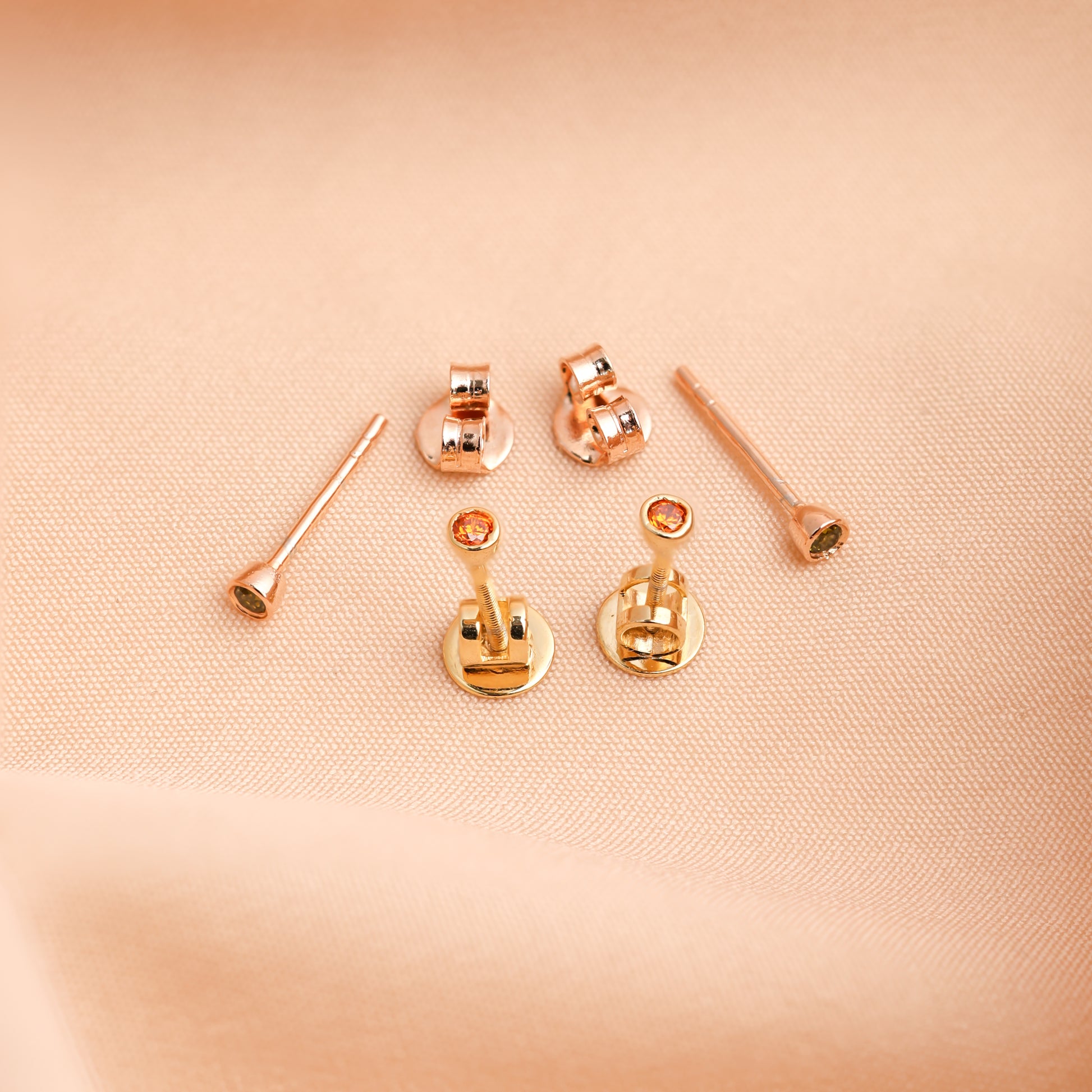 Minimalist stud earrings featuring birthstones