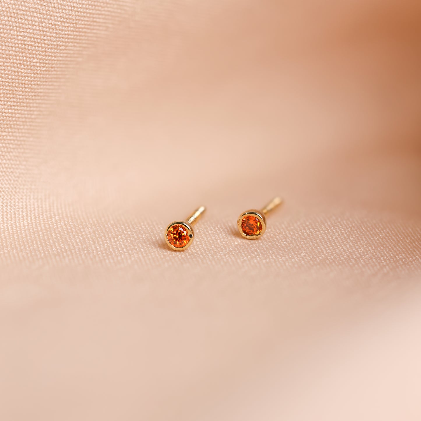 Unique birthstone stud earrings as a gift idea