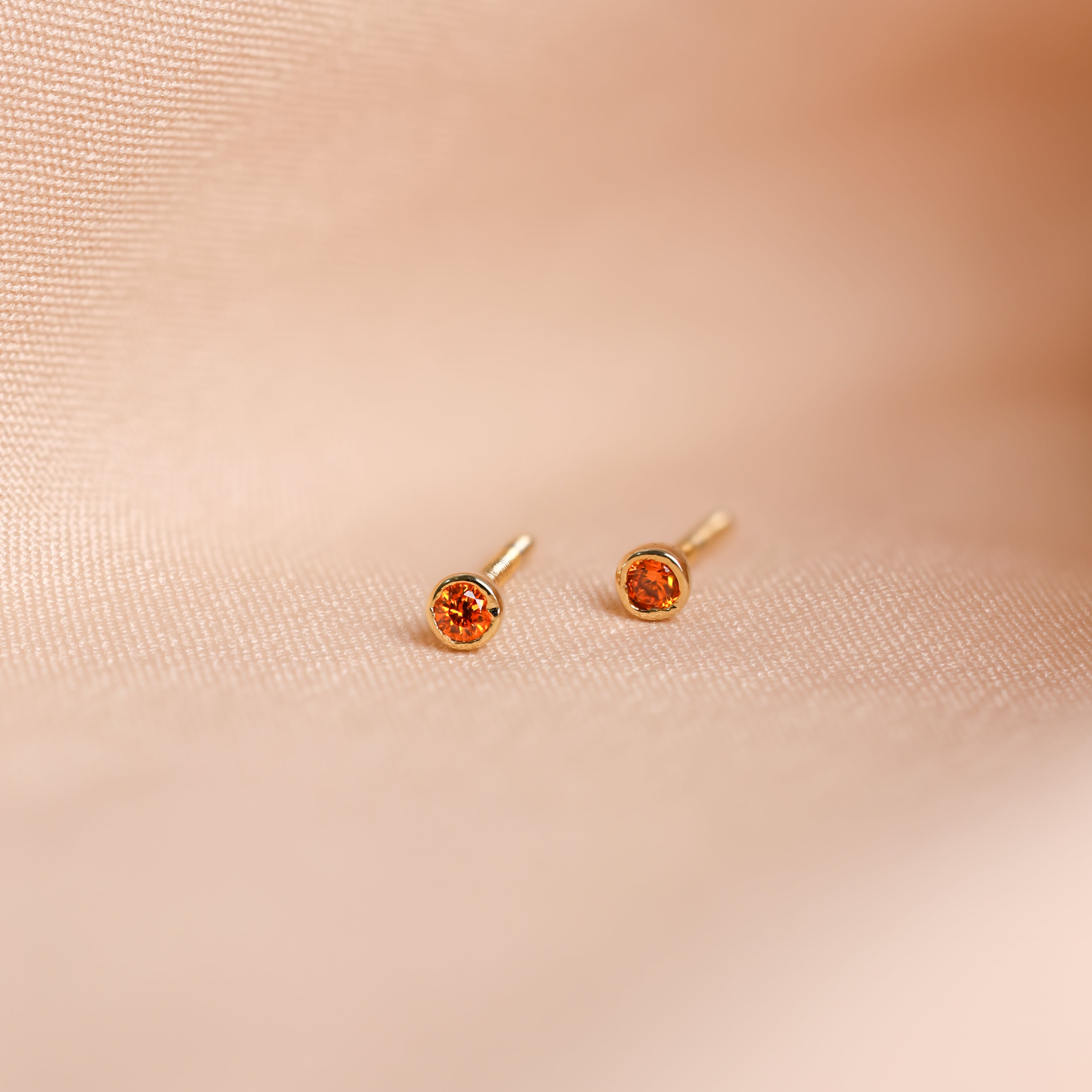 Unique birthstone stud earrings as a gift idea