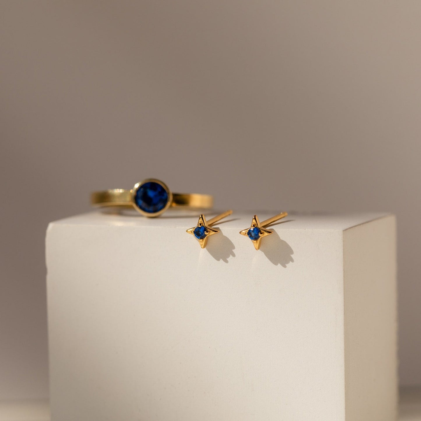 Celestial Elegance: Sapphire Star Stud Earrings