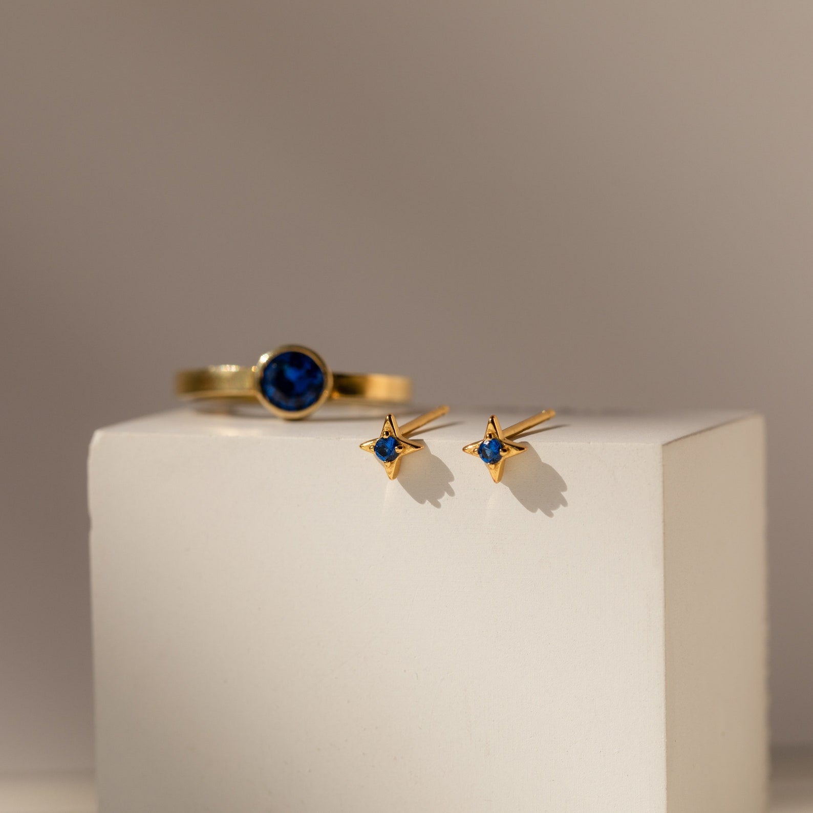 Celestial Elegance: Sapphire Star Stud Earrings