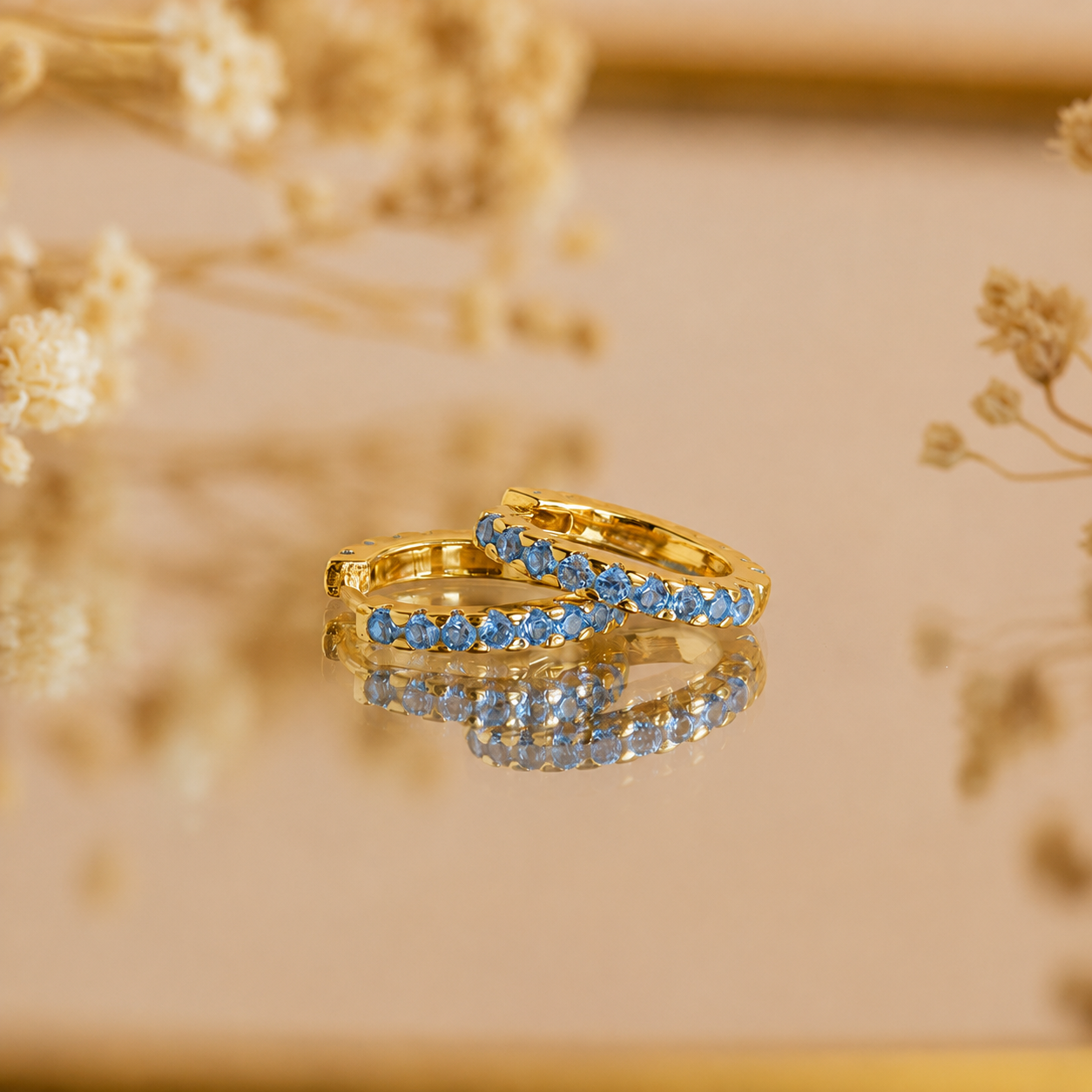 Ocean Breeze: Aquamarine Pave Huggie Earrings