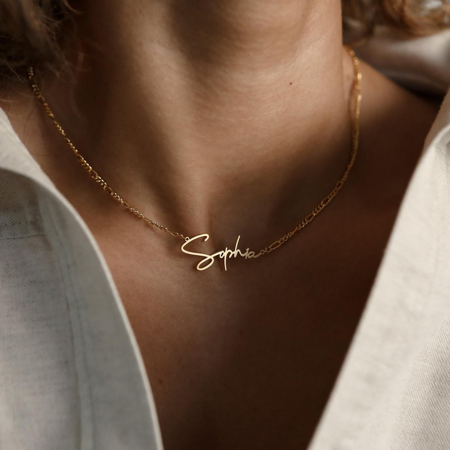 Make a Statement with the Carrie Name Necklace in Figaro Chain