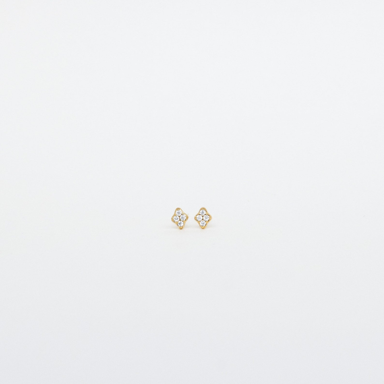 Avery Pavé Diamond Stud Earrings, featuring sparkling CZ diamonds on sterling silver or 18K gold, showcasing timeless elegance and sophistication