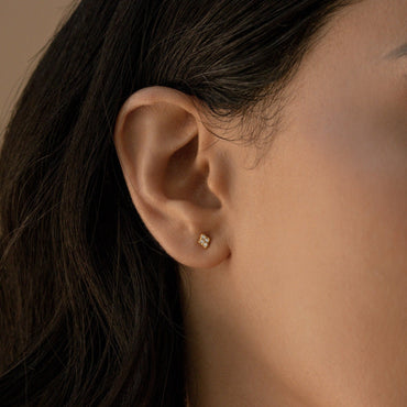 Avery Pavé Diamond Stud Earrings, featuring sparkling CZ diamonds on sterling silver or 18K gold, showcasing timeless elegance and sophistication
