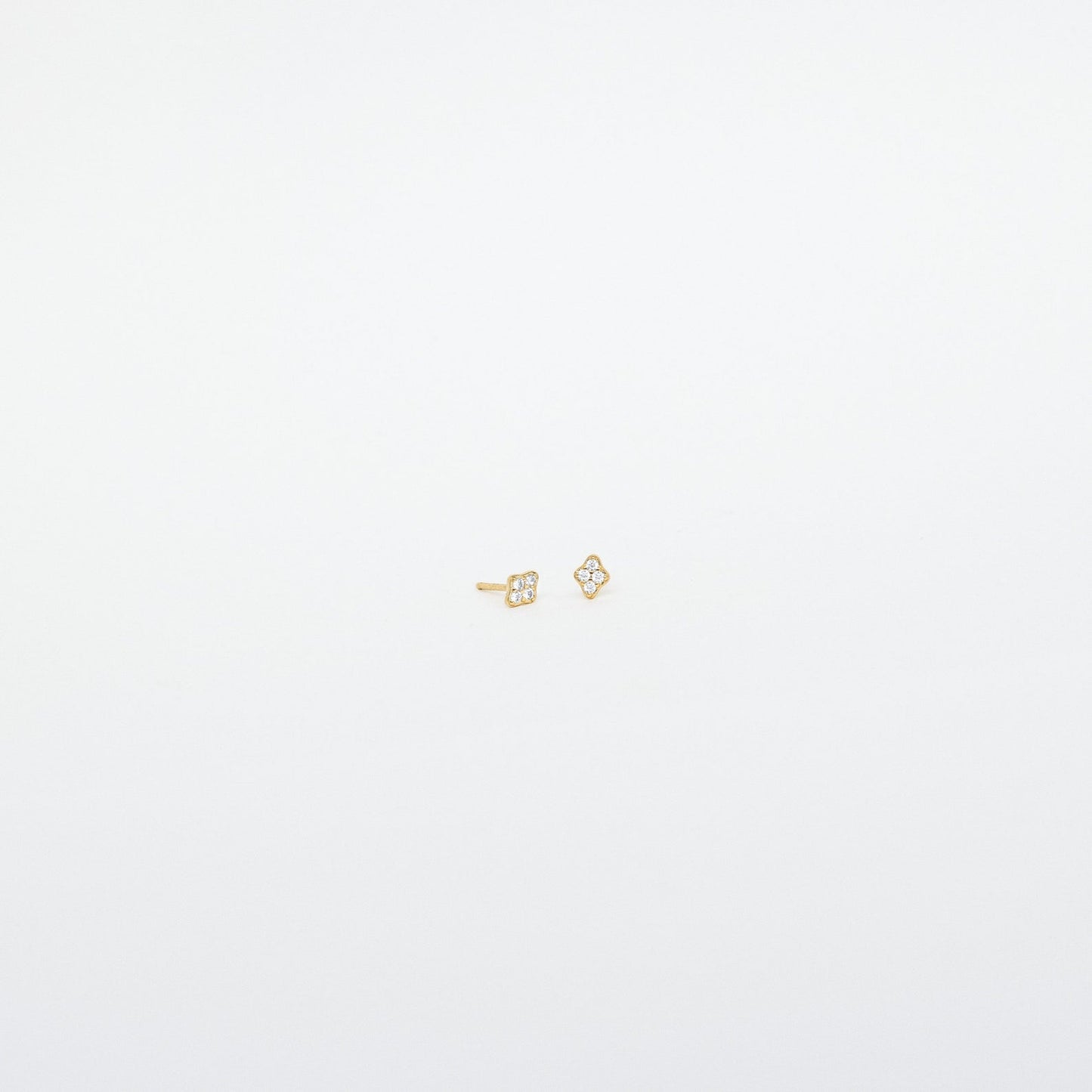 Avery Pavé Diamond Stud Earrings, featuring sparkling CZ diamonds on sterling silver or 18K gold, showcasing timeless elegance and sophistication