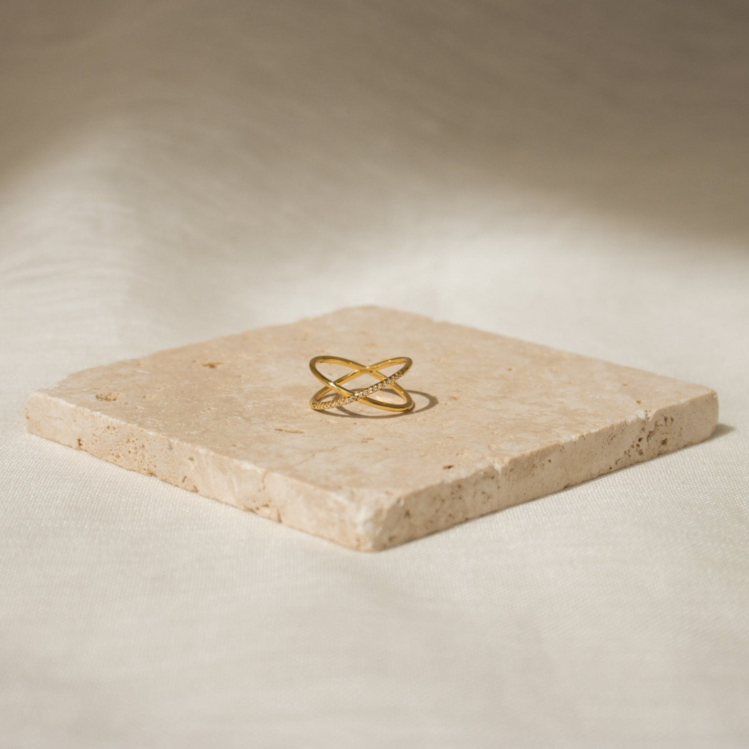Radiant Embrace: The Pave X Criss Cross Ring