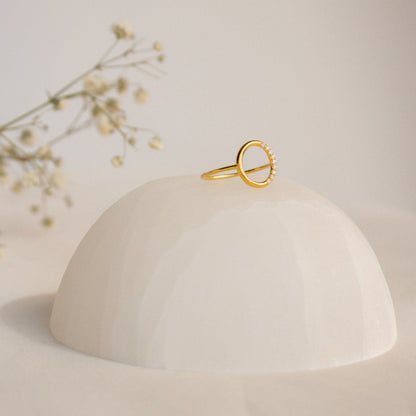 Radiant Simplicity: The Pave Open Circle Ring