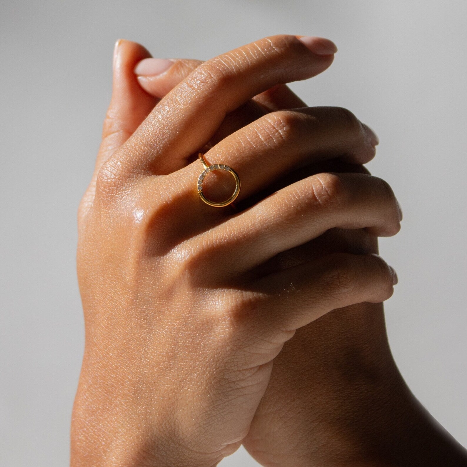 Radiant Simplicity: The Pave Open Circle Ring