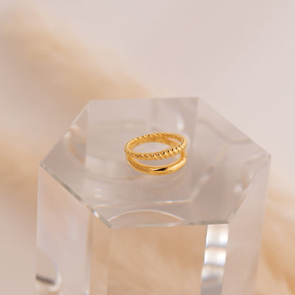 Dynamic Duo: Bold Fusion of Solid and Twisted Bands in the Minimalist Duo Ring