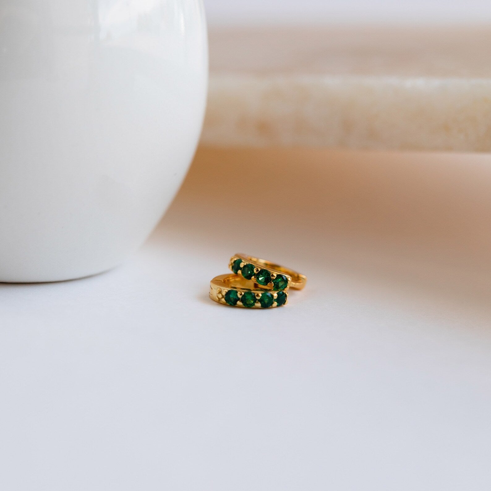 Emerald Huggie Hoops: Timeless Elegance in Stunning Green