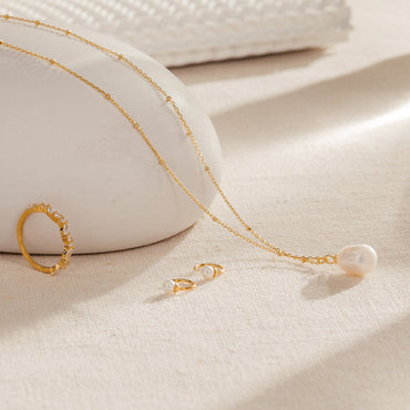 Timeless Elegance: Pearl Station Pendant Necklace