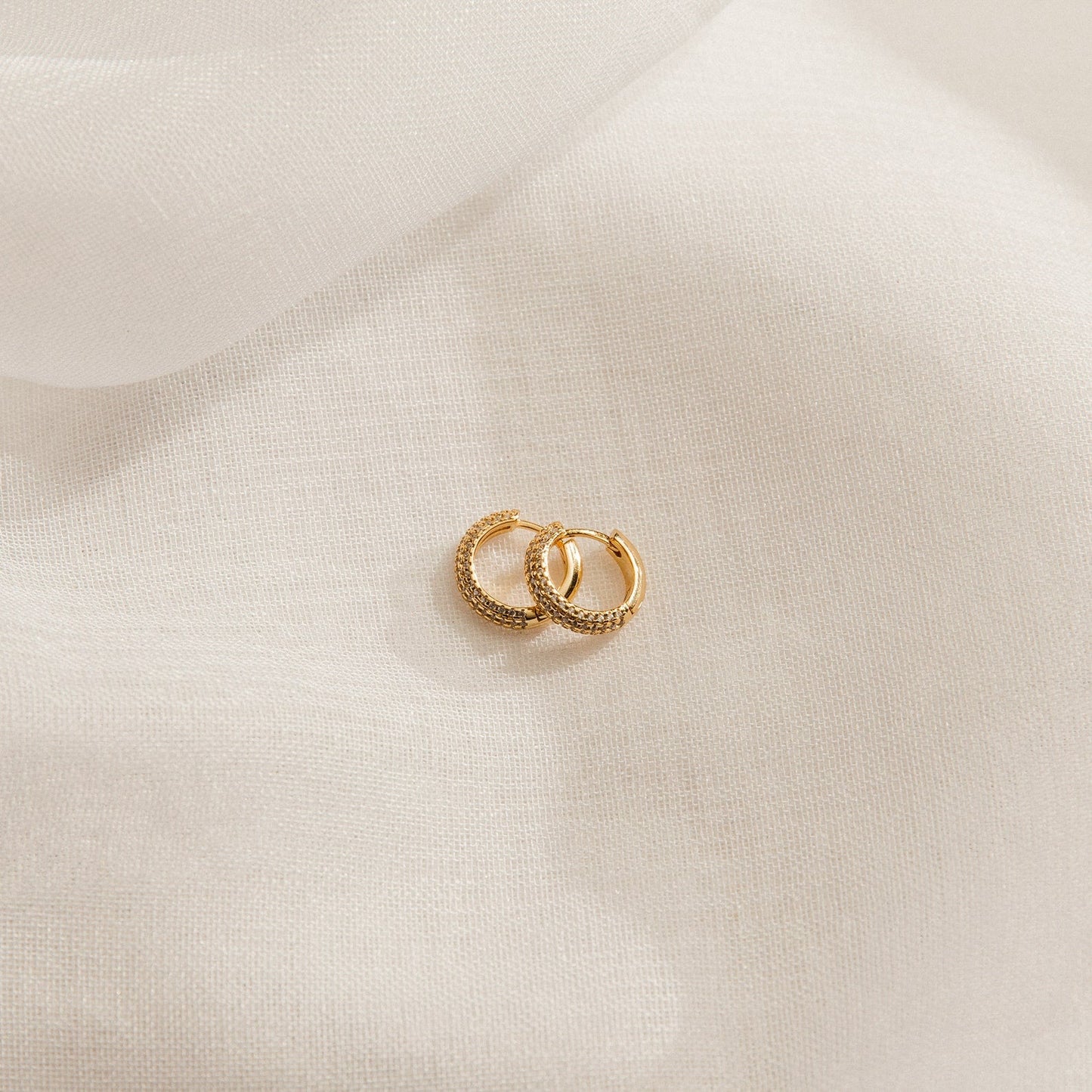 Illuminate Your Date Night Look with Our Clarissa Pave Huggies