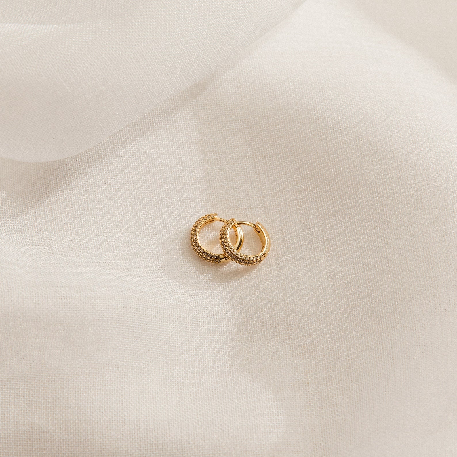 Illuminate Your Date Night Look with Our Clarissa Pave Huggies