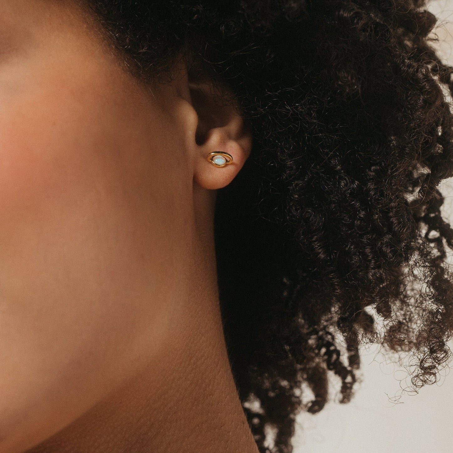 Saturn Opal Studs