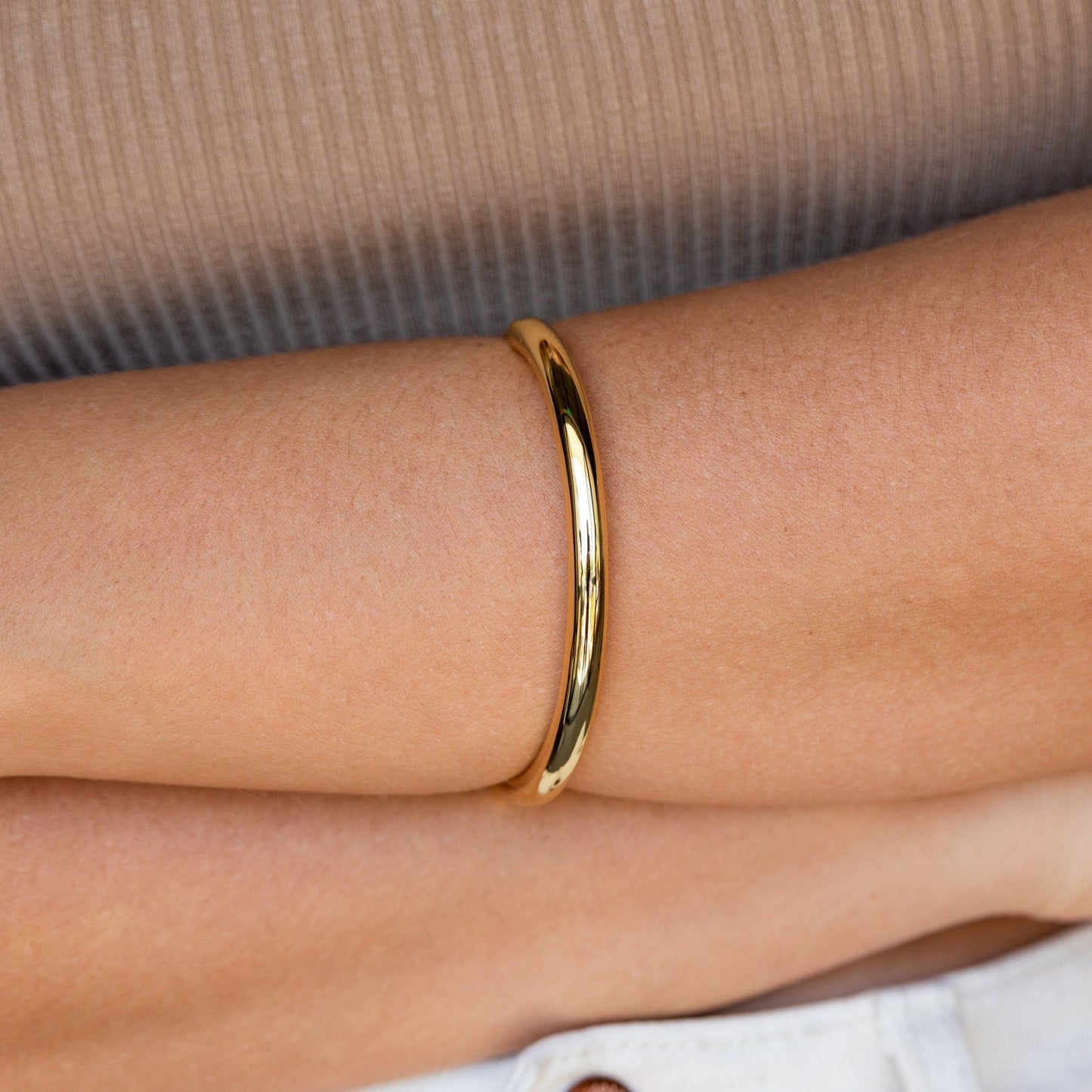 Aris Hinge Bangle, a modern vermeil cuff bracelet in sterling silver or 18K gold, featuring a sleek and streamlined design for effortless style