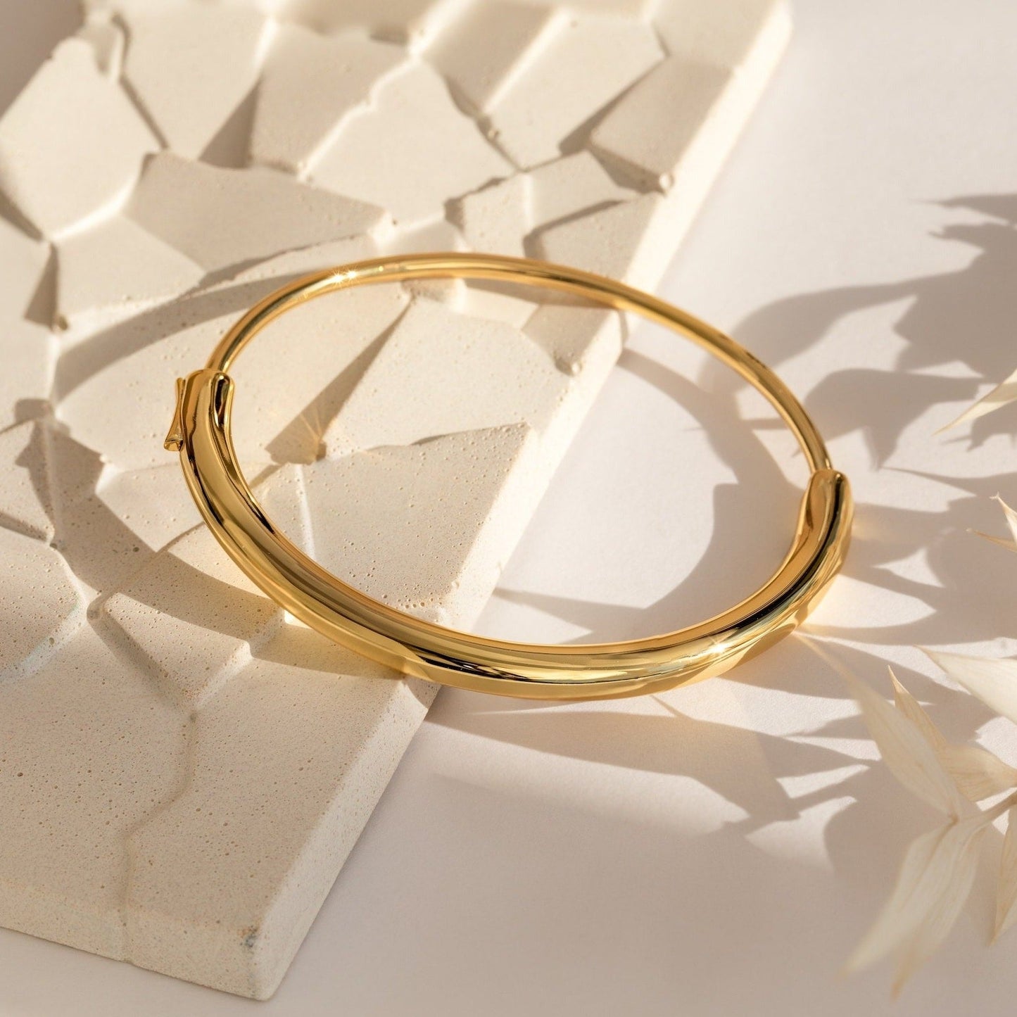 Aris Hinge Bangle, a modern vermeil cuff bracelet in sterling silver or 18K gold, featuring a sleek and streamlined design for effortless style