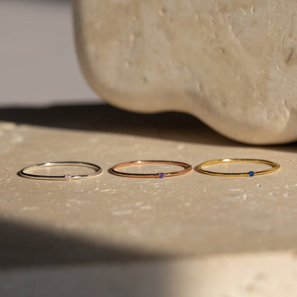 Delicate Birthstone Elegance: The Thin Mini Birthstone Ring