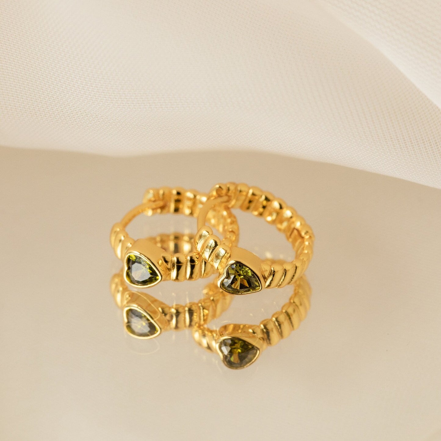 Unique Elegance: Peridot Heart Huggie Earrings 18K Gold